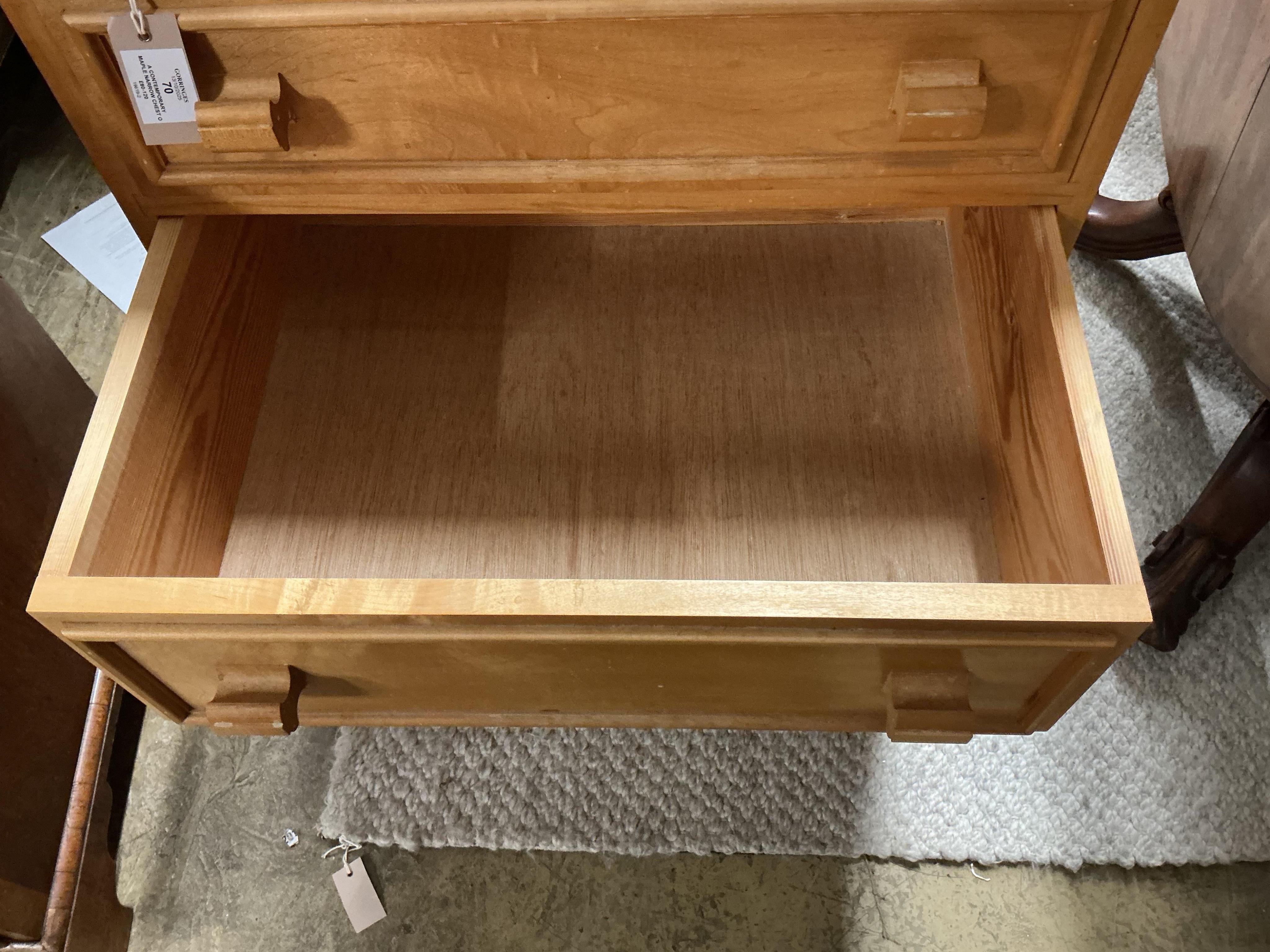 A Contemporary maple narrow chest of drawers, width 61cm, depth 46cm, height 92cm